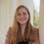 Headshot of Maeve Myers posing on UVA's campus