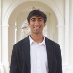 Headshot of Rohan Iyer posing on UVA's grounds